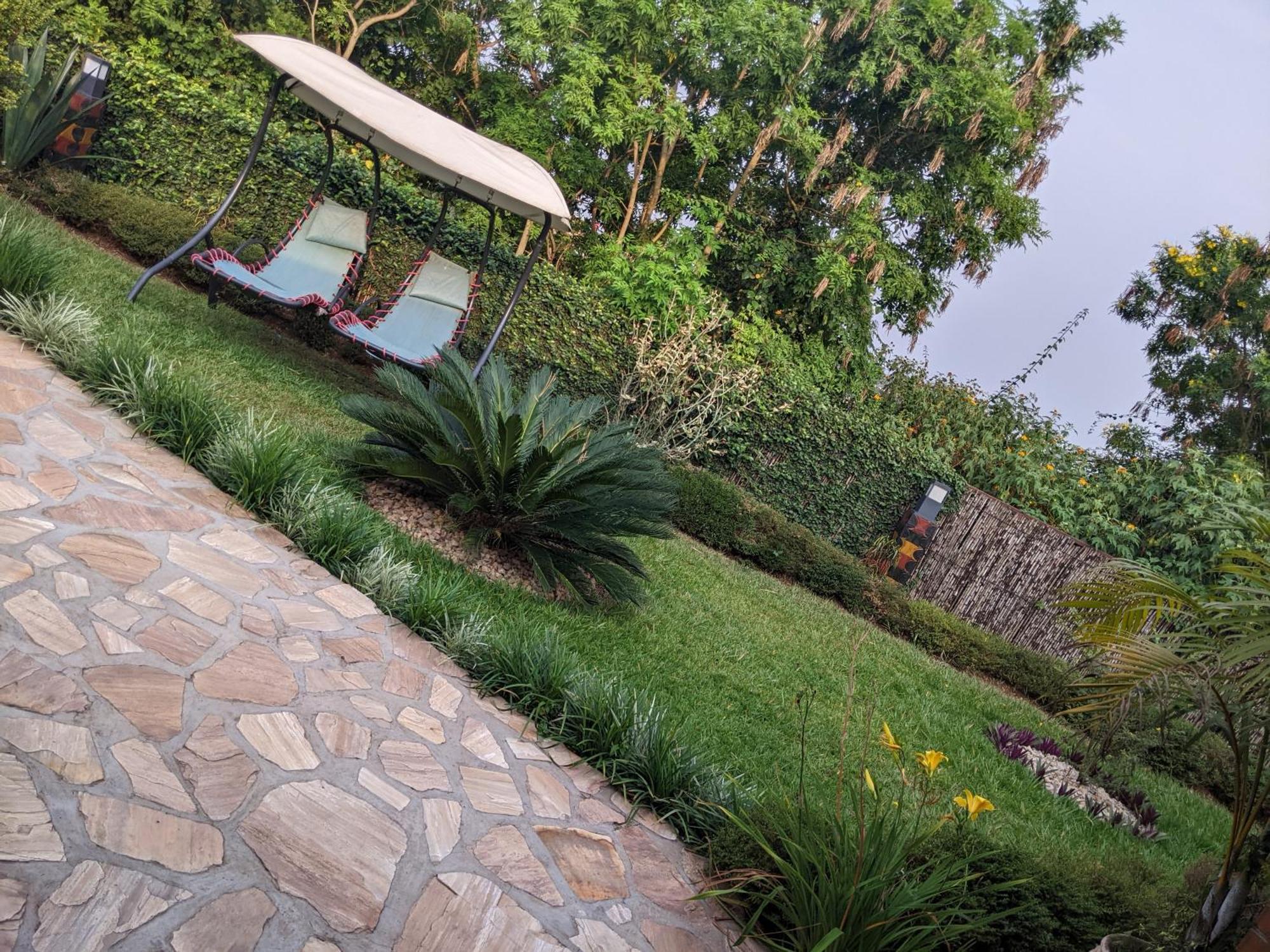 קיגאלי Inside Afrika Boutique Hotel מראה חיצוני תמונה